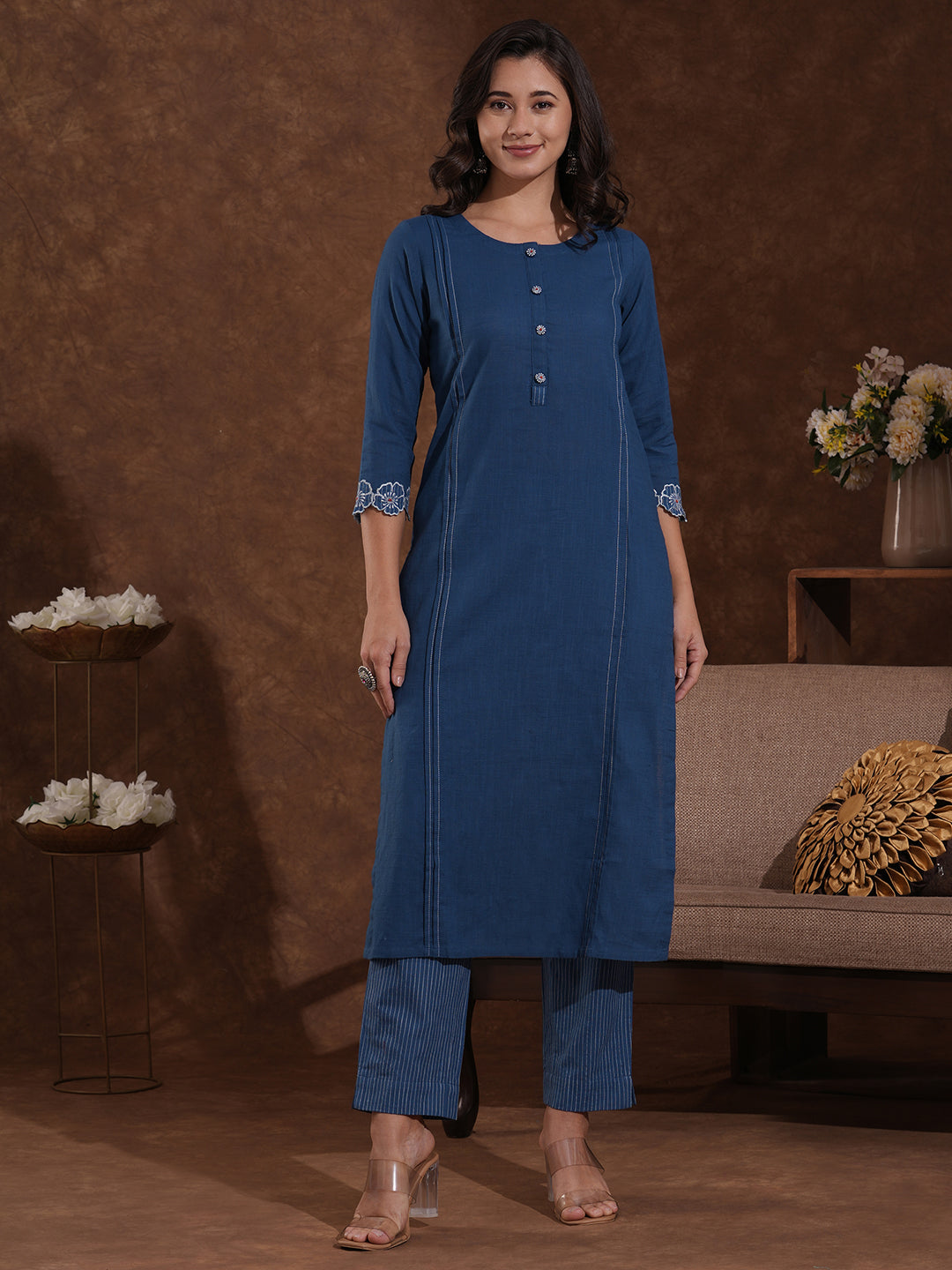 Straight fit cotton slurb kurta with cutwork embroidery.