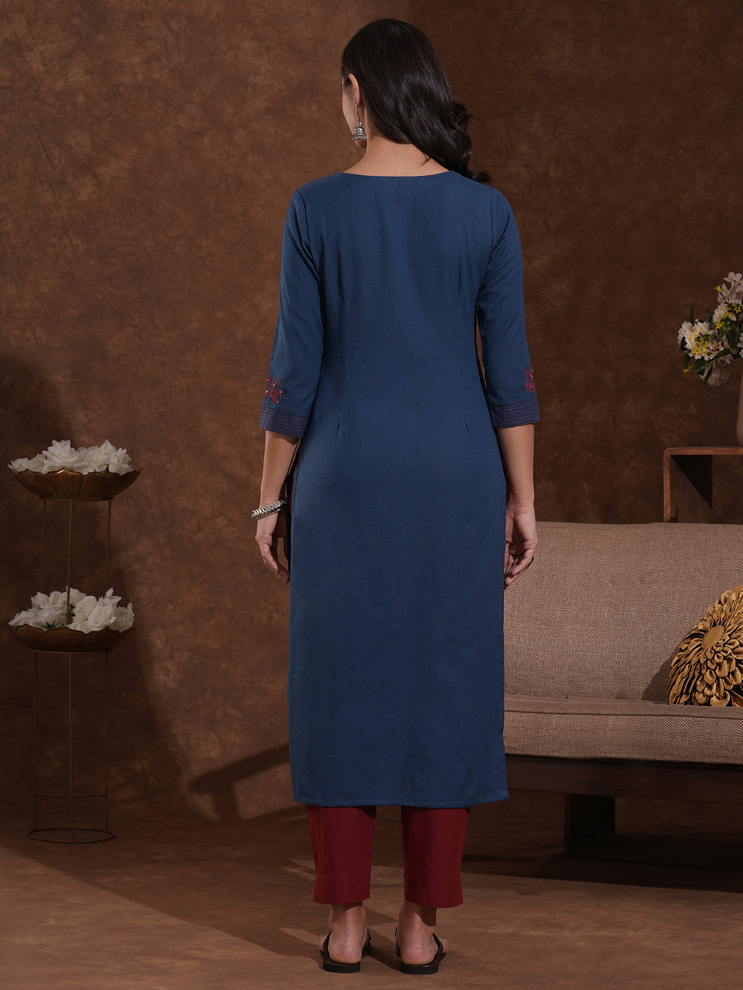Embroidered straight fit kurta in cotton flex with sequin work.