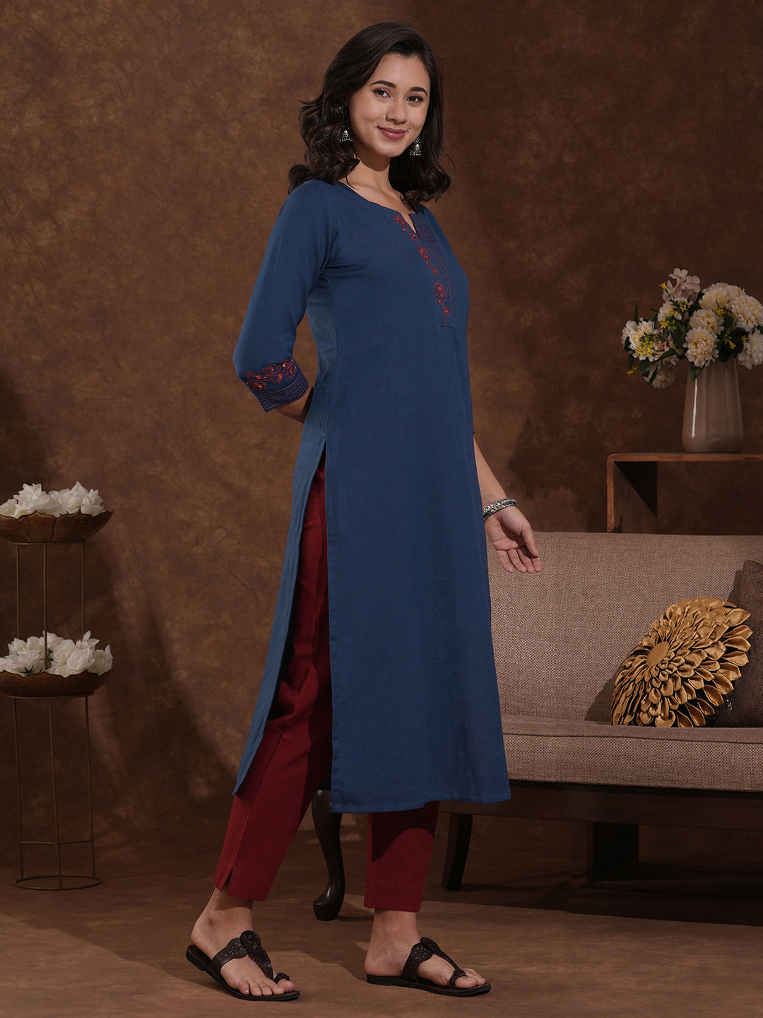 Embroidered straight fit kurta in cotton flex with sequin work.