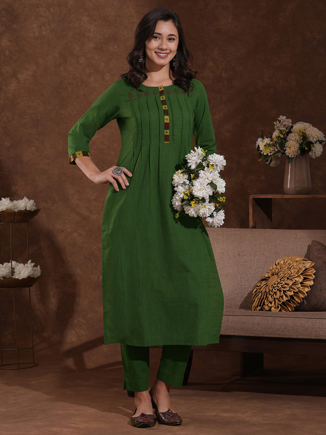 Straight fit kurta with block printed shoulder yoke and tucks in the front with ajarakh trim fabric.