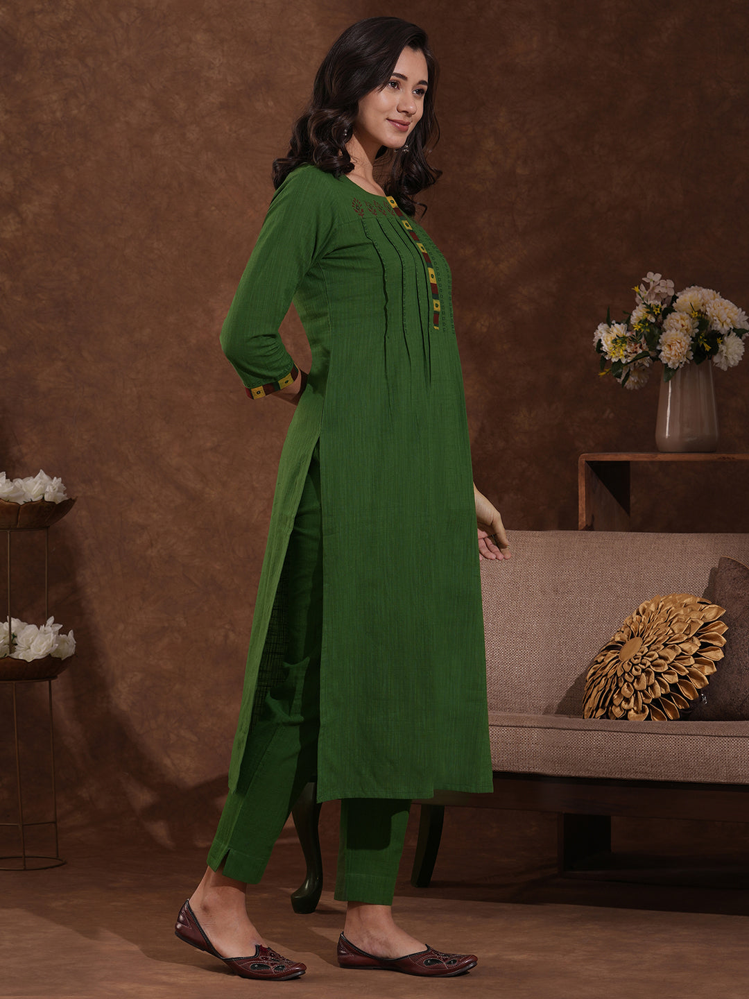 Straight fit kurta with block printed shoulder yoke and tucks in the front with ajarakh trim fabric.