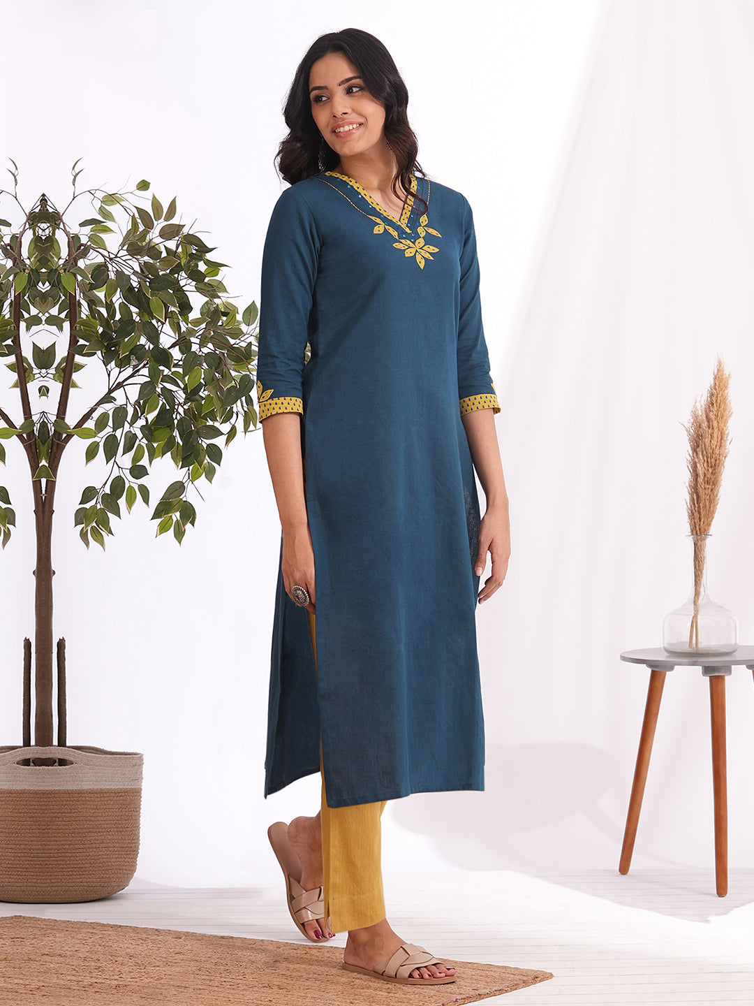 Straight fit kurta with contrast applique on neck and sleeves with contrast trim detailing