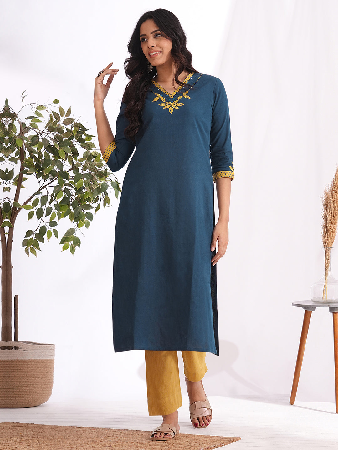 Straight fit kurta with contrast applique on neck and sleeves with contrast trim detailing