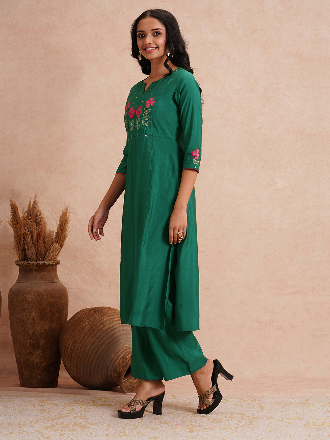 Party Edit- A-line kurta with machine applique and embroidery on the yoke and sleeves.