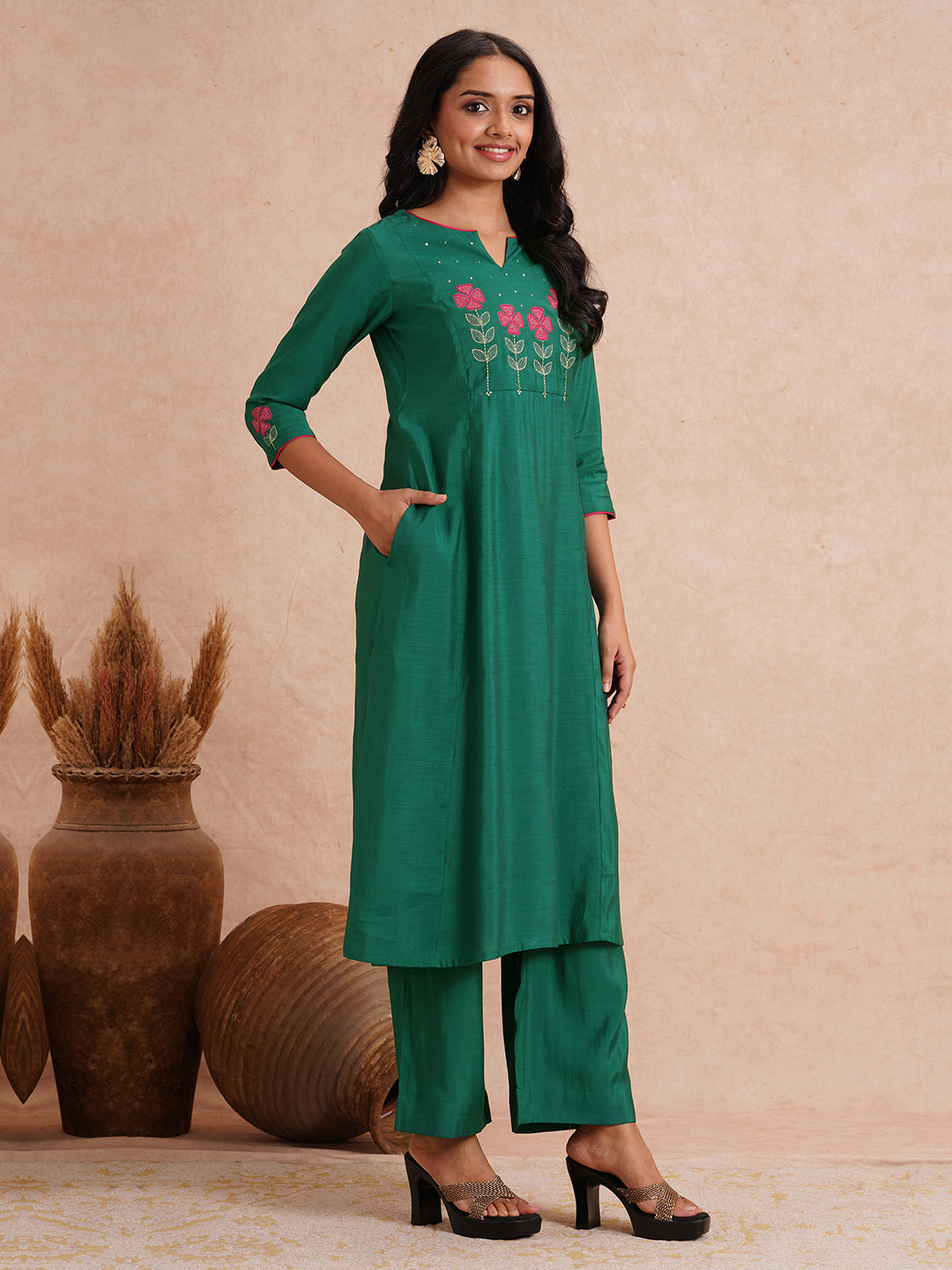 Party Edit- A-line kurta with machine applique and embroidery on the yoke and sleeves.