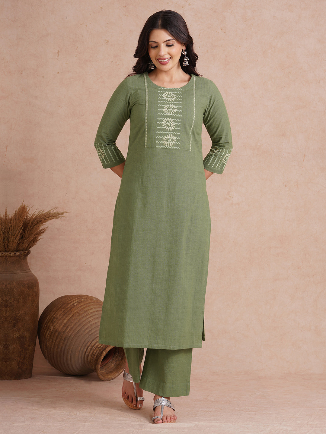 Straight fit kurta with block printed yoke and sleeves.