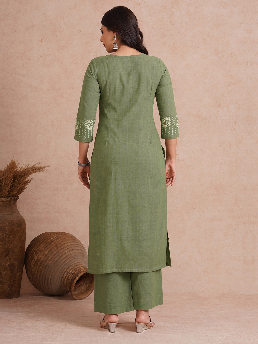Straight fit kurta with block printed yoke and sleeves.