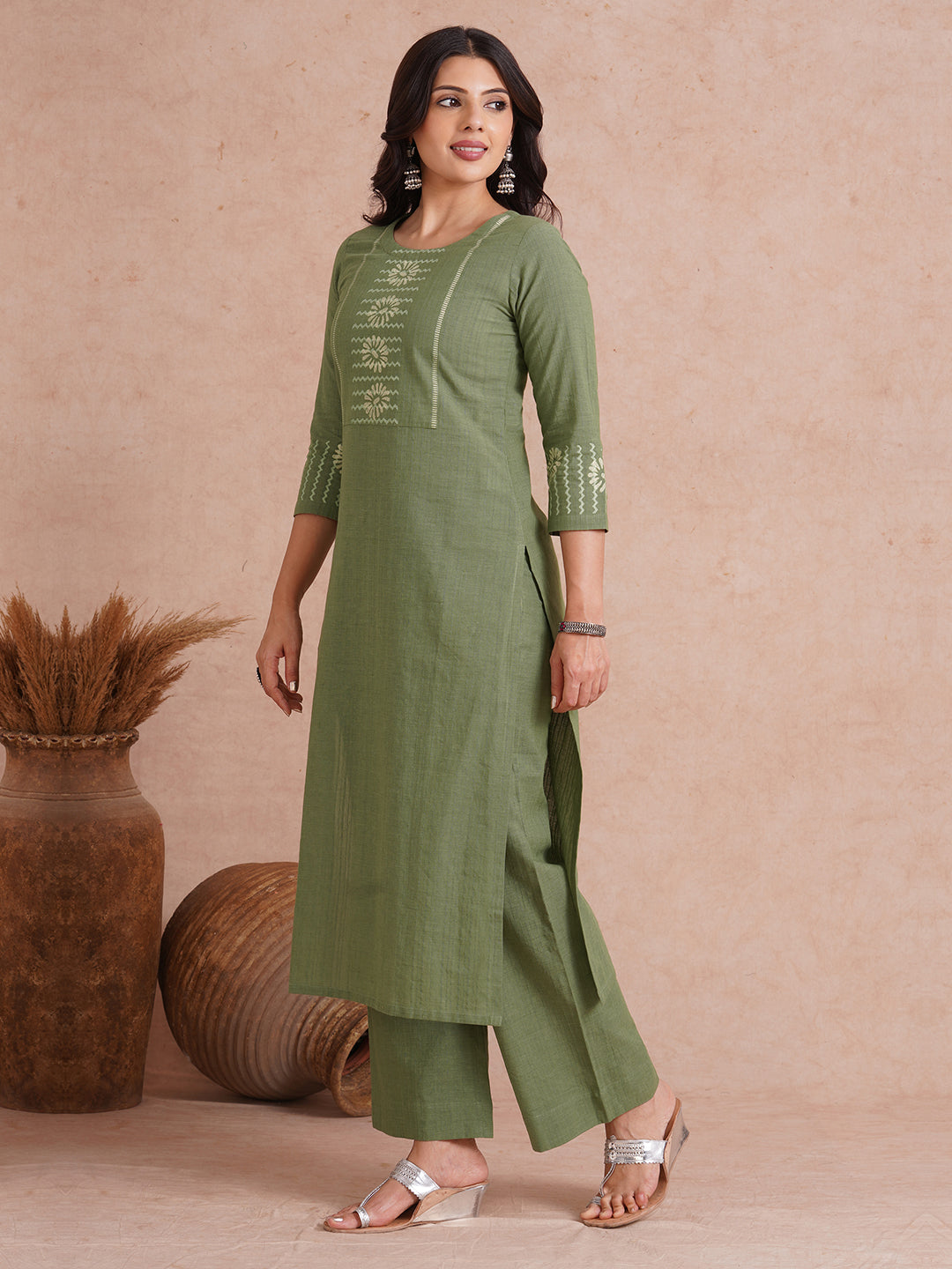 Straight fit kurta with block printed yoke and sleeves.