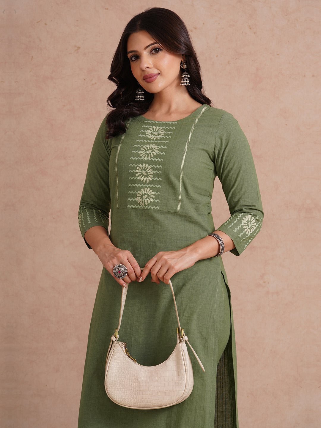 Straight fit kurta with block printed yoke and sleeves.