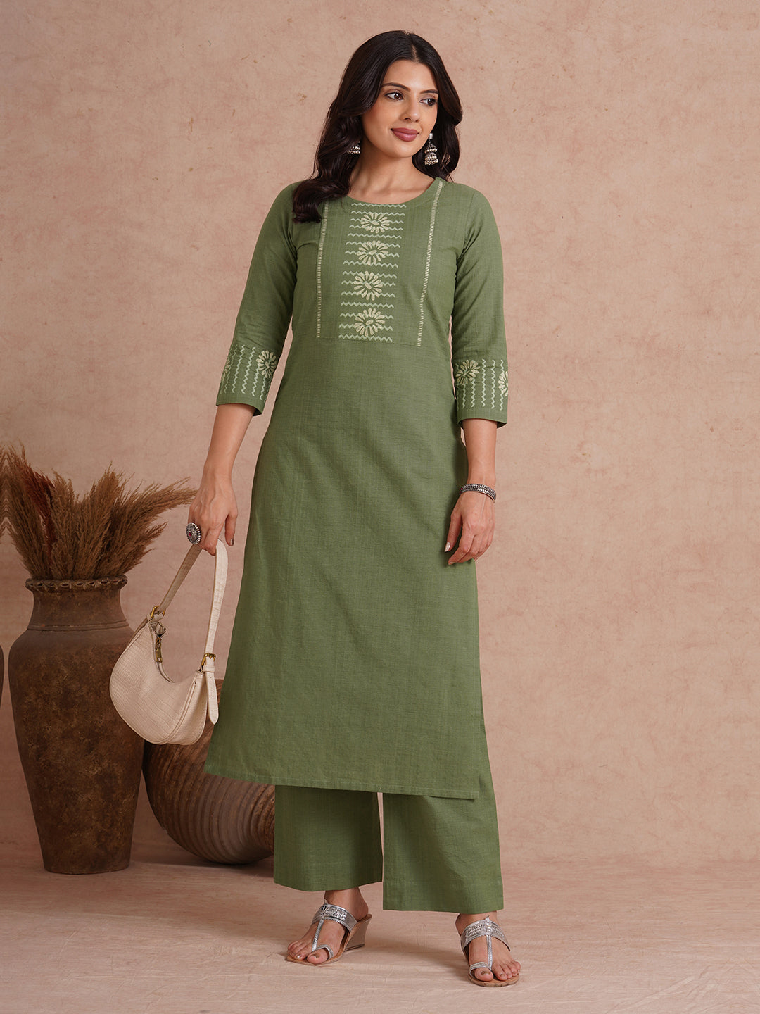 Straight fit kurta with block printed yoke and sleeves.