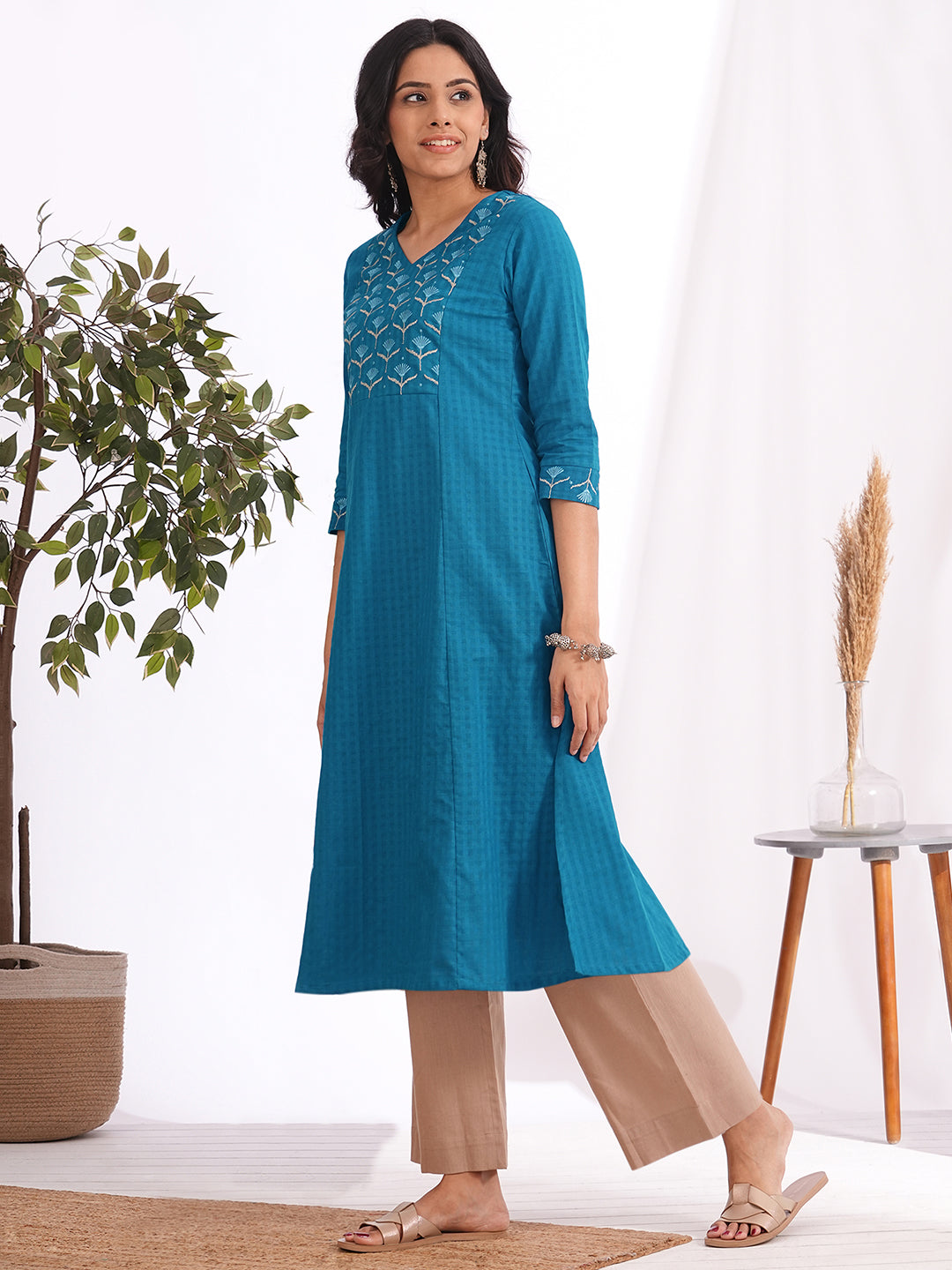 Woven checks fabric A-line kurta with embroidered yoke and cuff