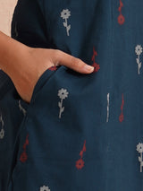 Printed A-line kurta with contrast fabric detailing with mirror work.