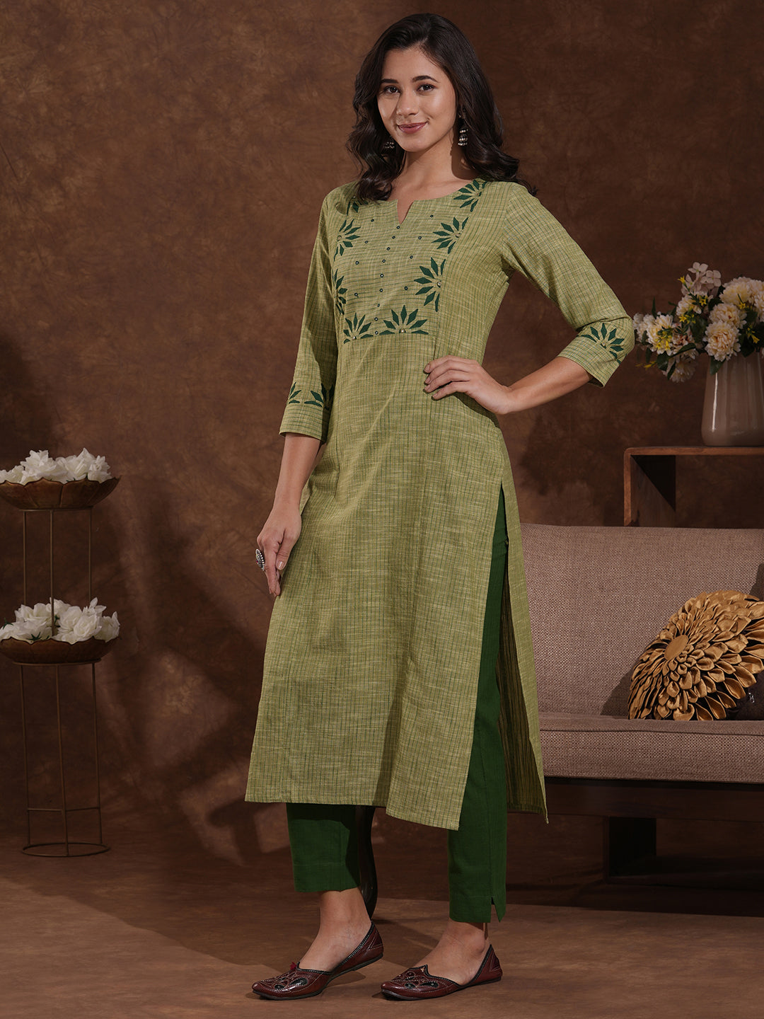 Straight fit kurta in woven stripes with block printed yoke and sleeves.