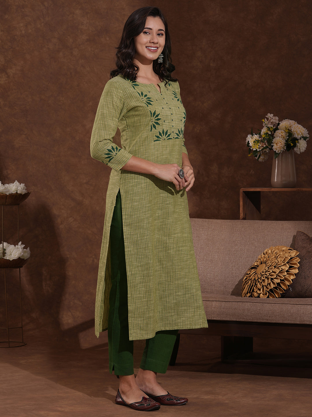 Straight fit kurta in woven stripes with block printed yoke and sleeves.