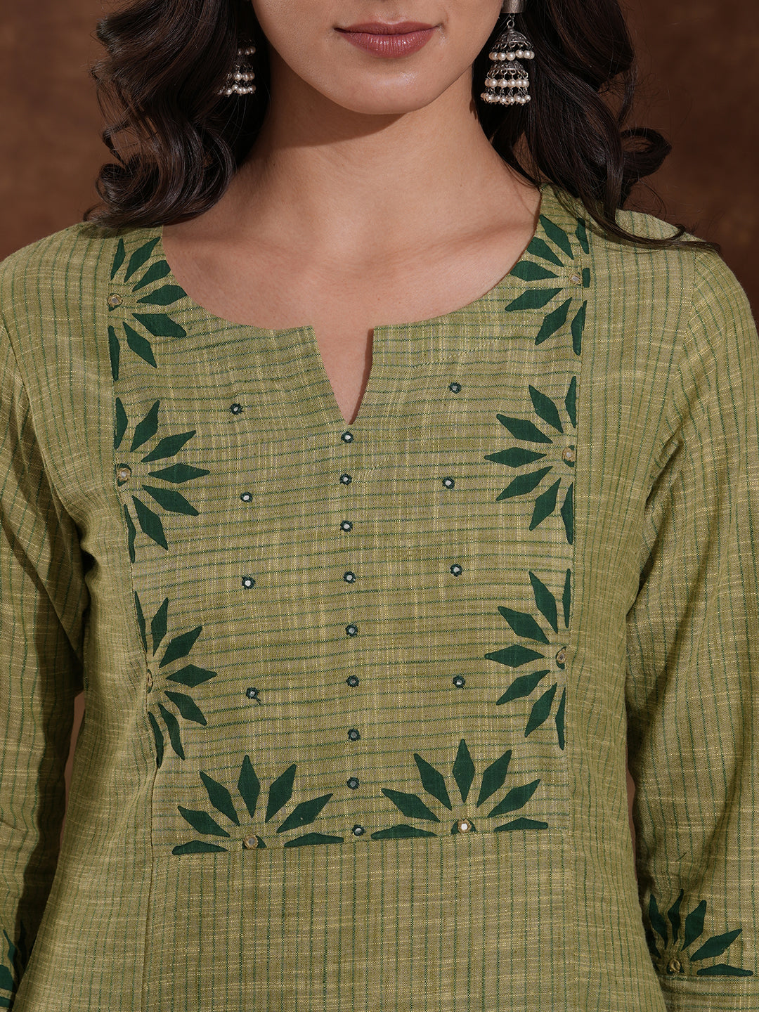 Straight fit kurta in woven stripes with block printed yoke and sleeves.