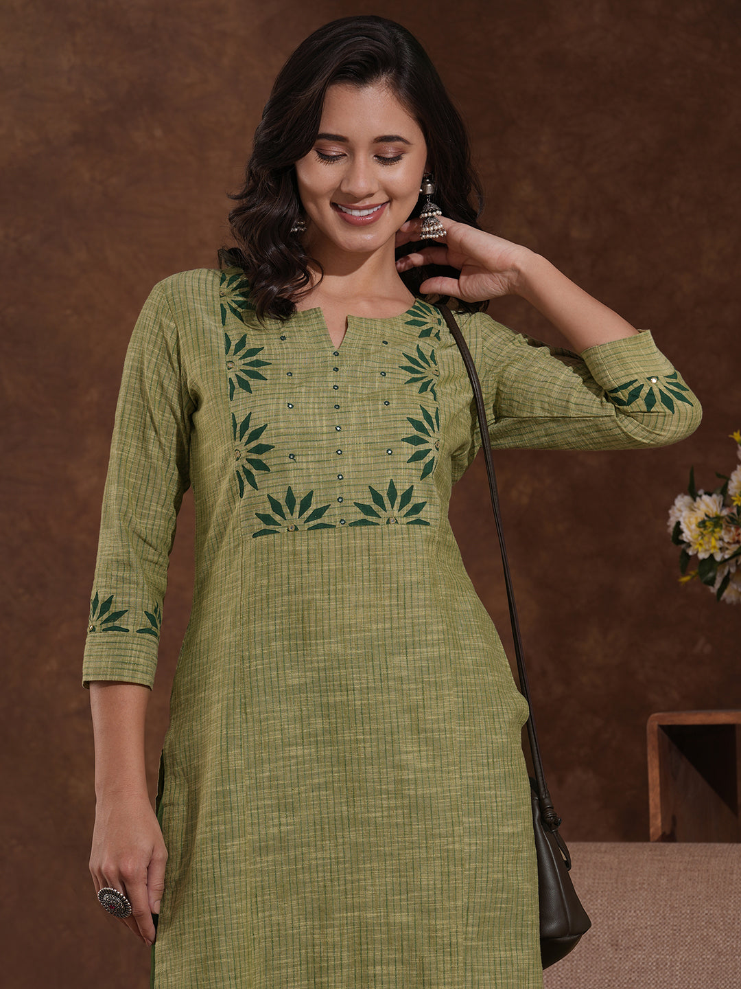 Straight fit kurta in woven stripes with block printed yoke and sleeves.