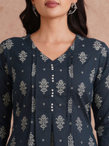 A-line kurta with tucks and box pleat in the front highlighted with handwork mirrors.