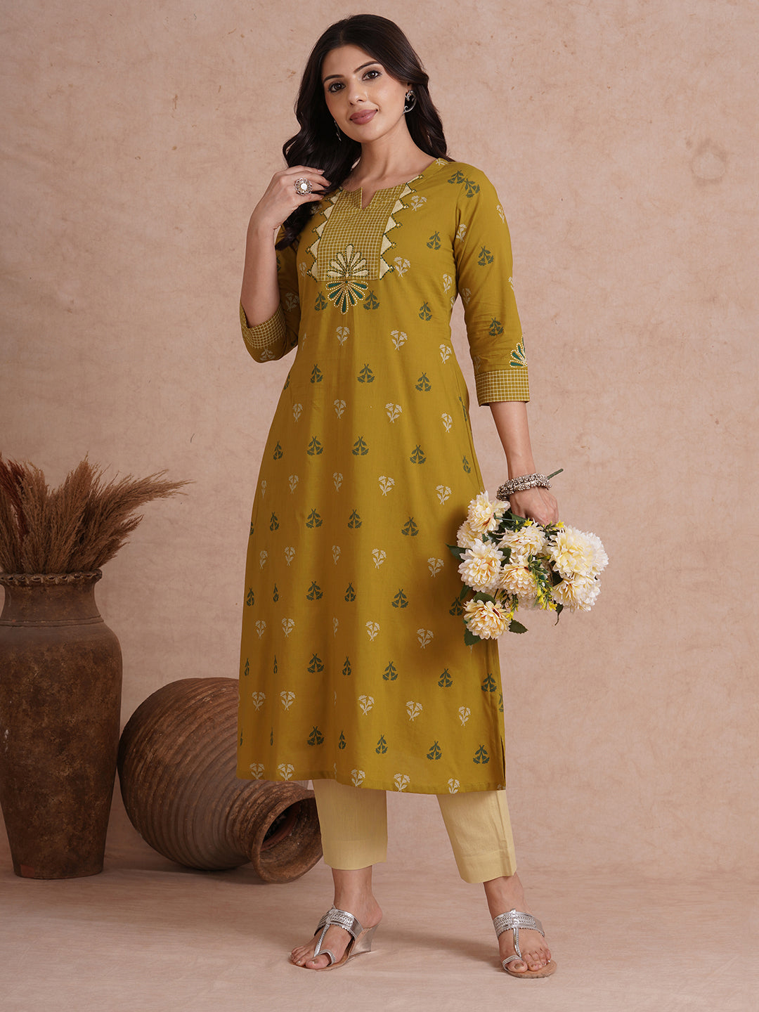 A-line printed kurta with trim fabric yoke and cuff highlighted with block print.