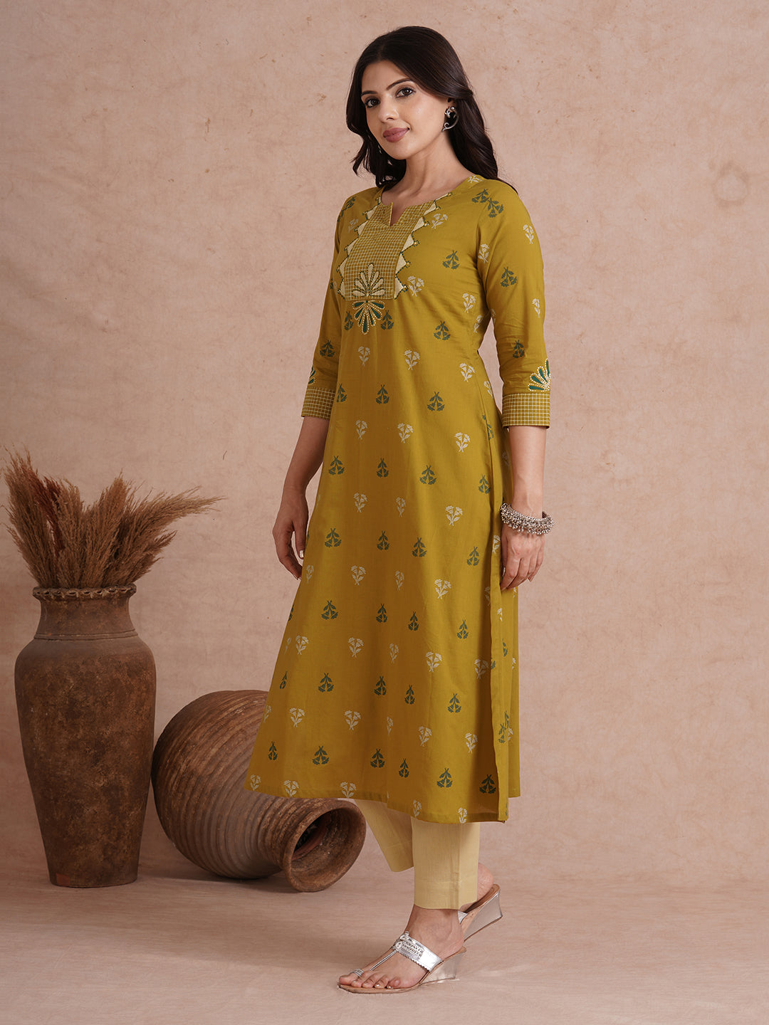 A-line printed kurta with trim fabric yoke and cuff highlighted with block print.