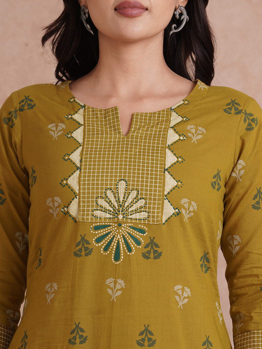 A-line printed kurta with trim fabric yoke and cuff highlighted with block print.