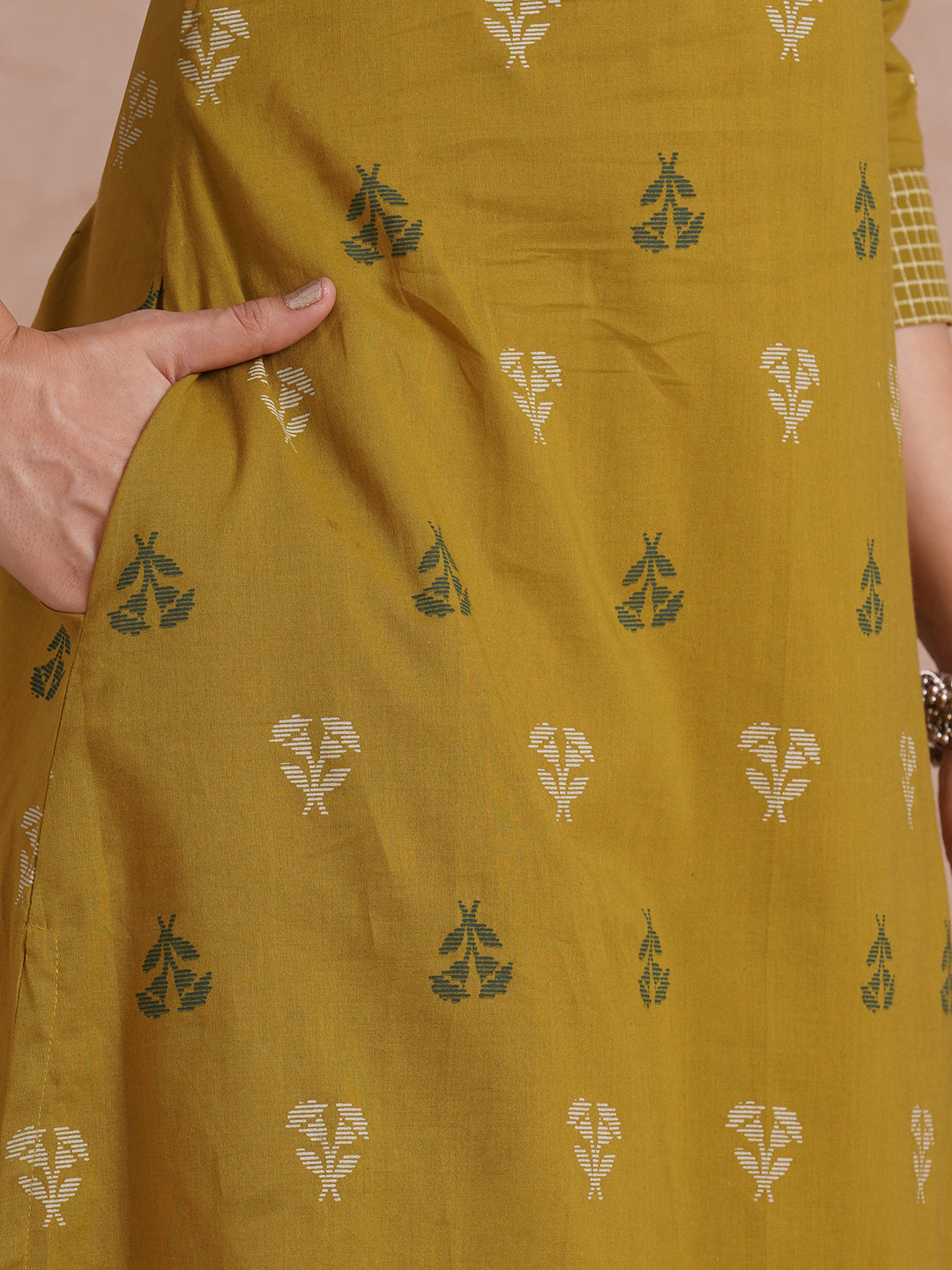 A-line printed kurta with trim fabric yoke and cuff highlighted with block print.