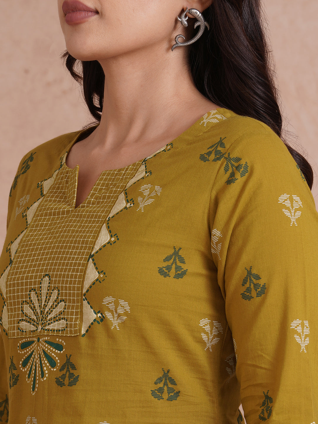 A-line printed kurta with trim fabric yoke and cuff highlighted with block print.