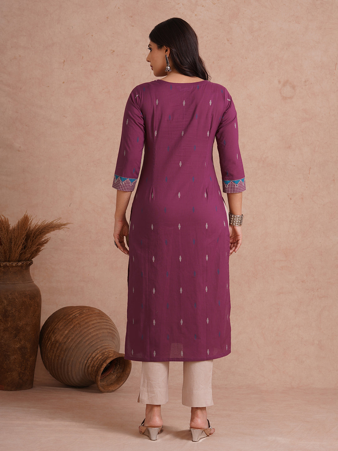 Straight fit printed kurta with trim fabric placket and cuff highlighted with block print.