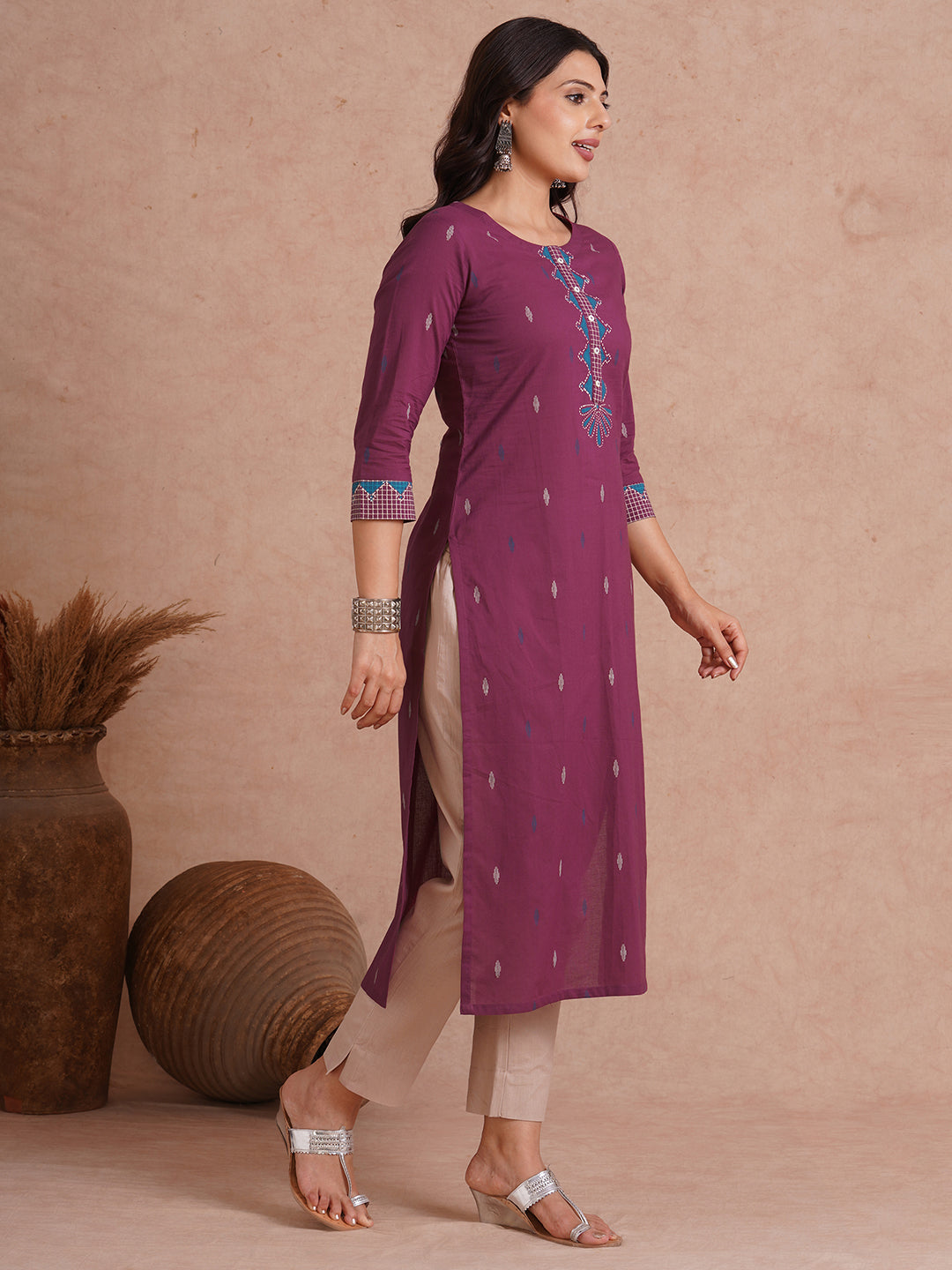 Straight fit printed kurta with trim fabric placket and cuff highlighted with block print.
