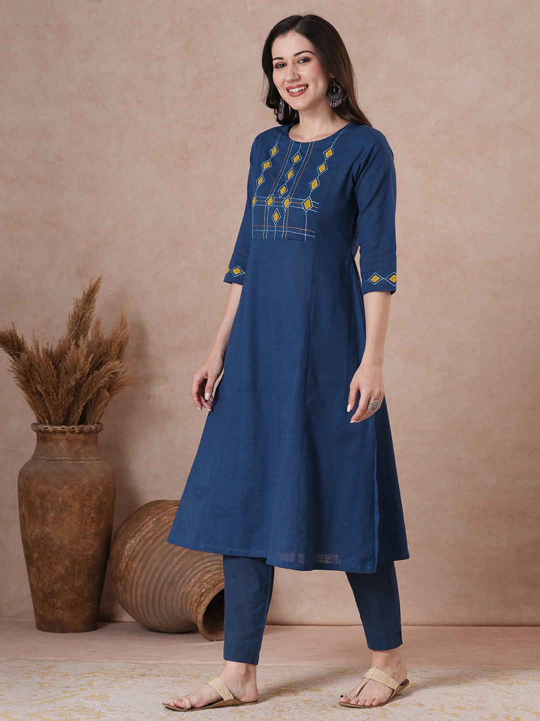 A-Line Cotton Kurta with Woven Texture, Embroidered Yoke and Geometric Applique