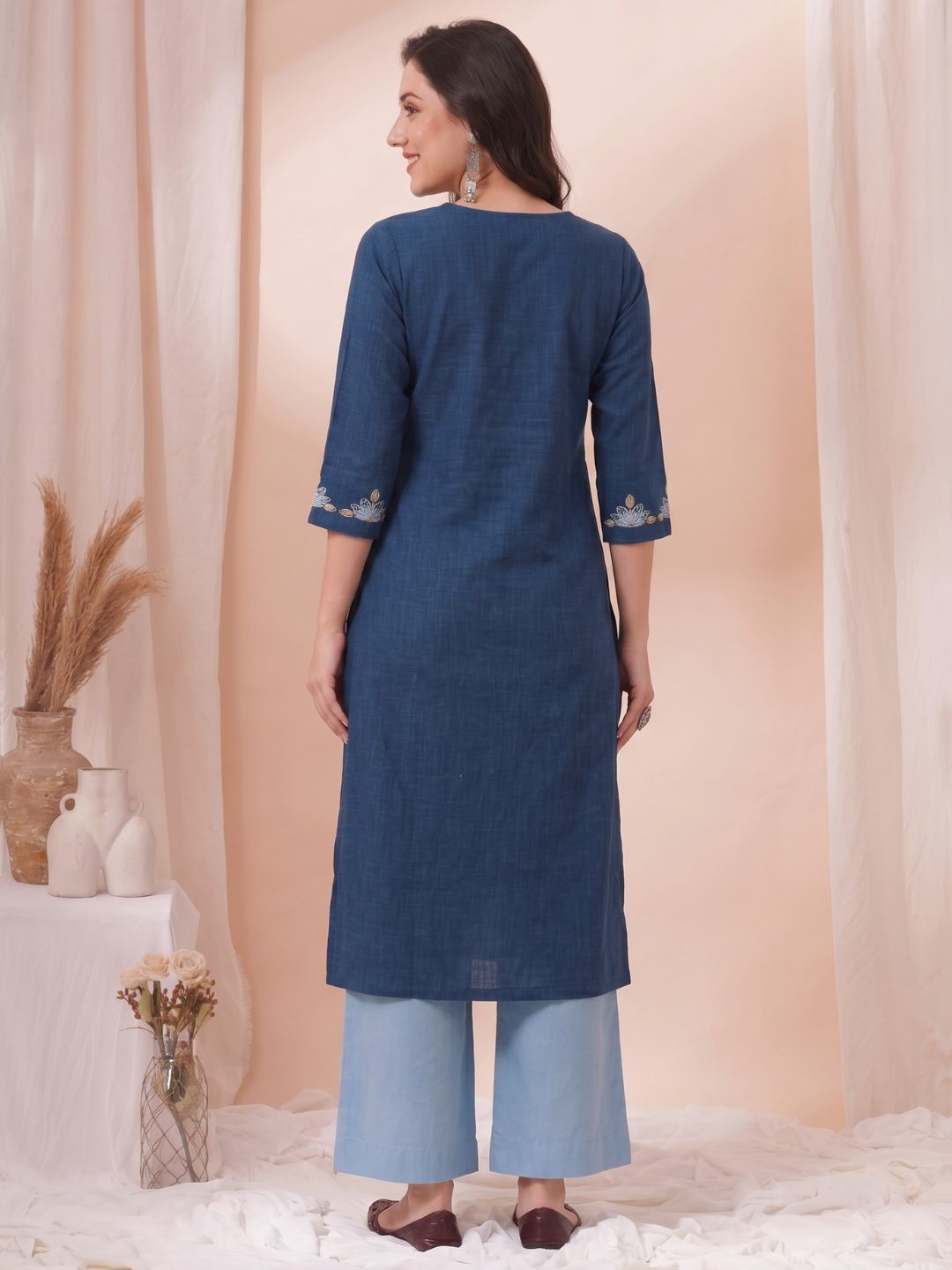 A-Line Cotton Slub Kurta with Floral Cordwork Embroidery on placket and sleeves.