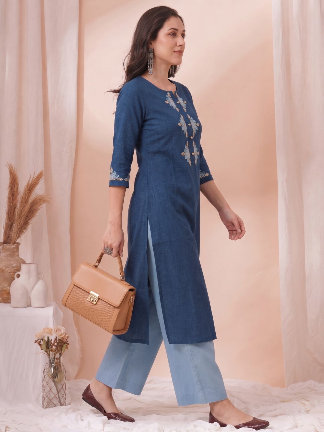 A-Line Cotton Slub Kurta with Floral Cordwork Embroidery on placket and sleeves.