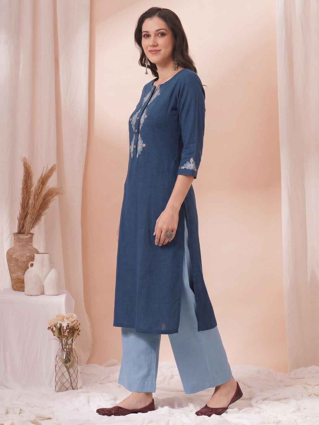 A-Line Cotton Slub Kurta with Floral Cordwork Embroidery on placket and sleeves.