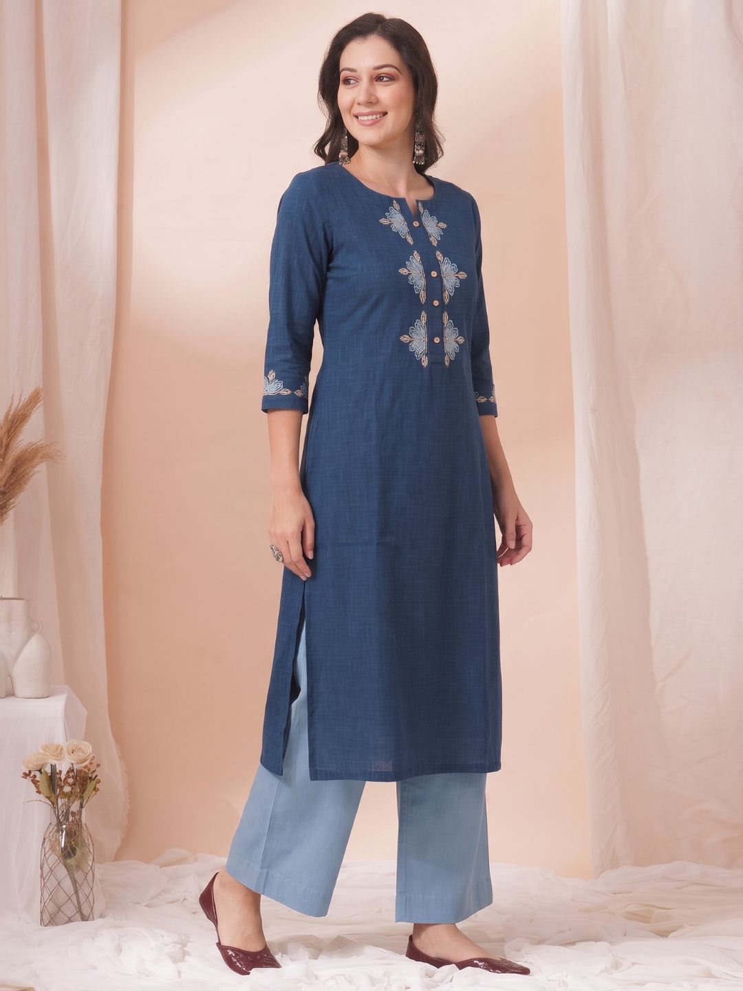 A-Line Cotton Slub Kurta with Floral Cordwork Embroidery on placket and sleeves.