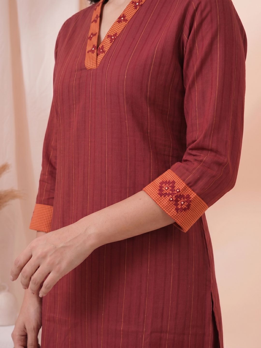 Straight Fit Textured Cotton Stripe Kurta with Hand Embroidery & Contrast Collar Detail.