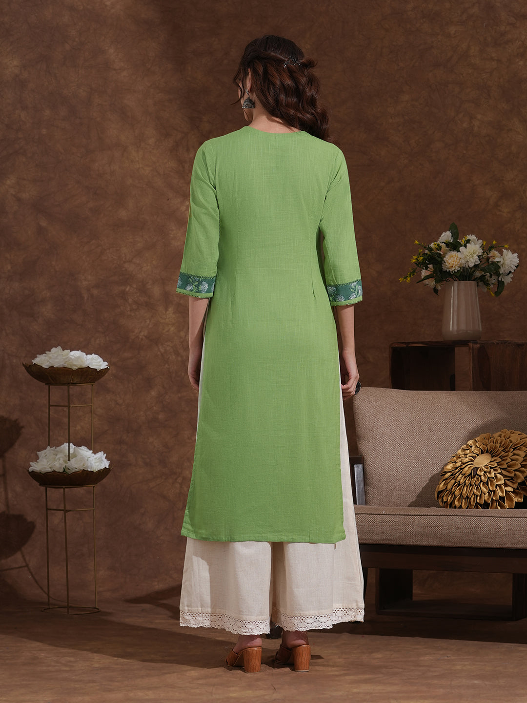 Straight fit kurta with Ajrakh overlap yoke and cuff with handwork highlight.