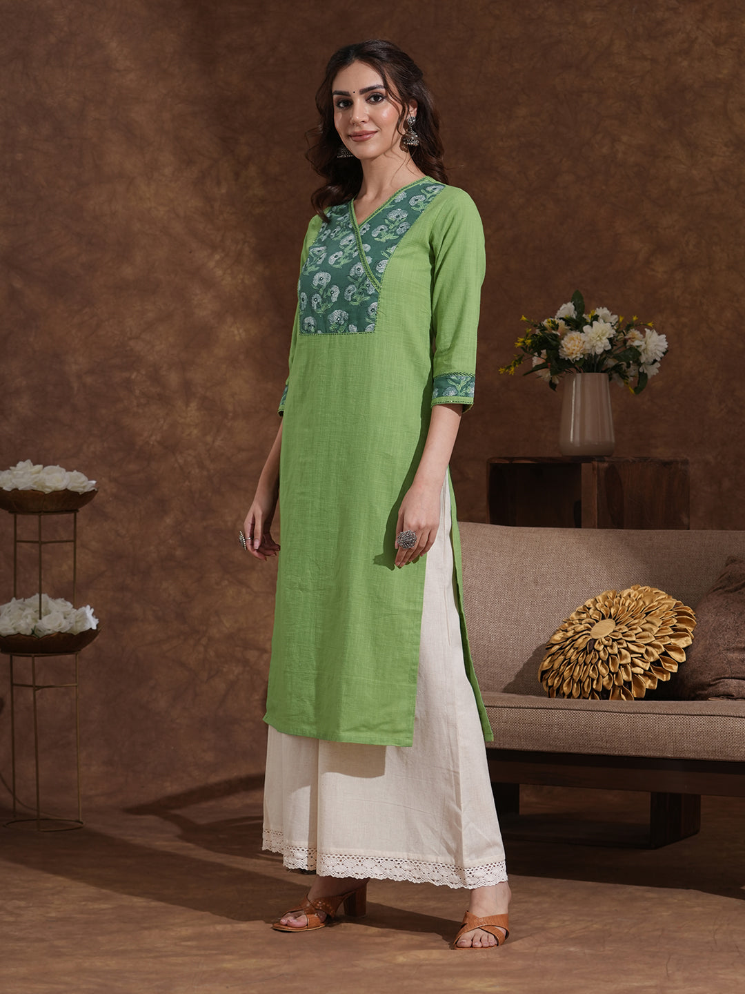 Straight fit kurta with Ajrakh overlap yoke and cuff with handwork highlight.