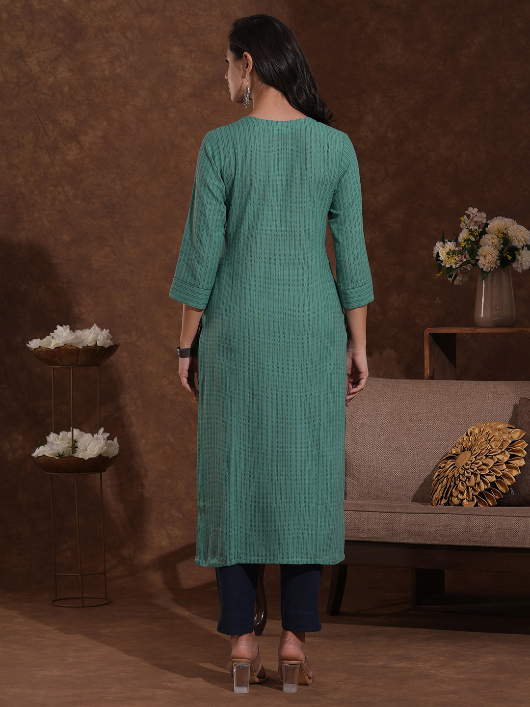 Shoulder princess straight fit dobby striped kurta with embroidered yoke.