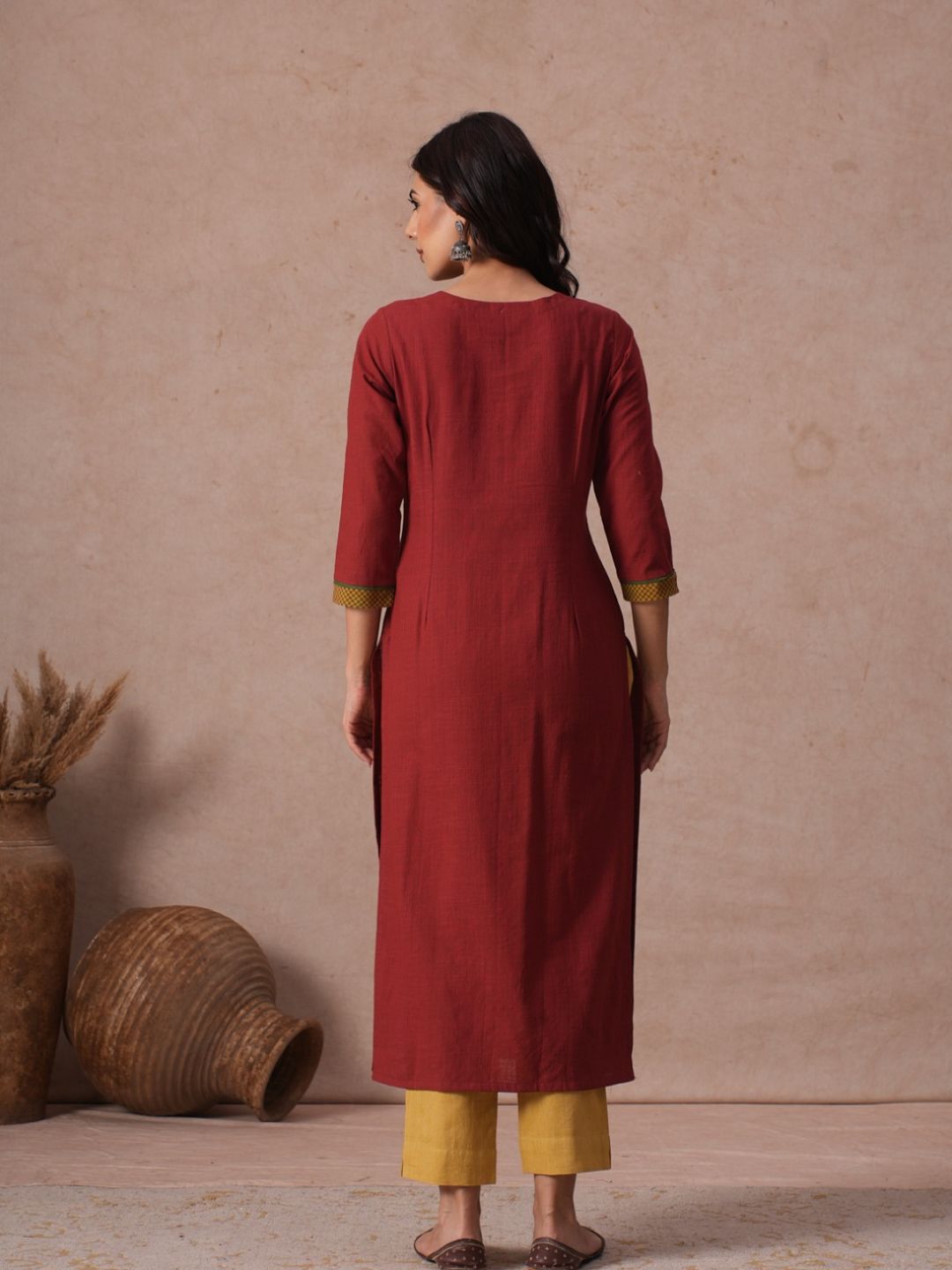 Cotton Straight Fit Kurta with Machine Applique and Contrast Fabric Sleeve Trims.