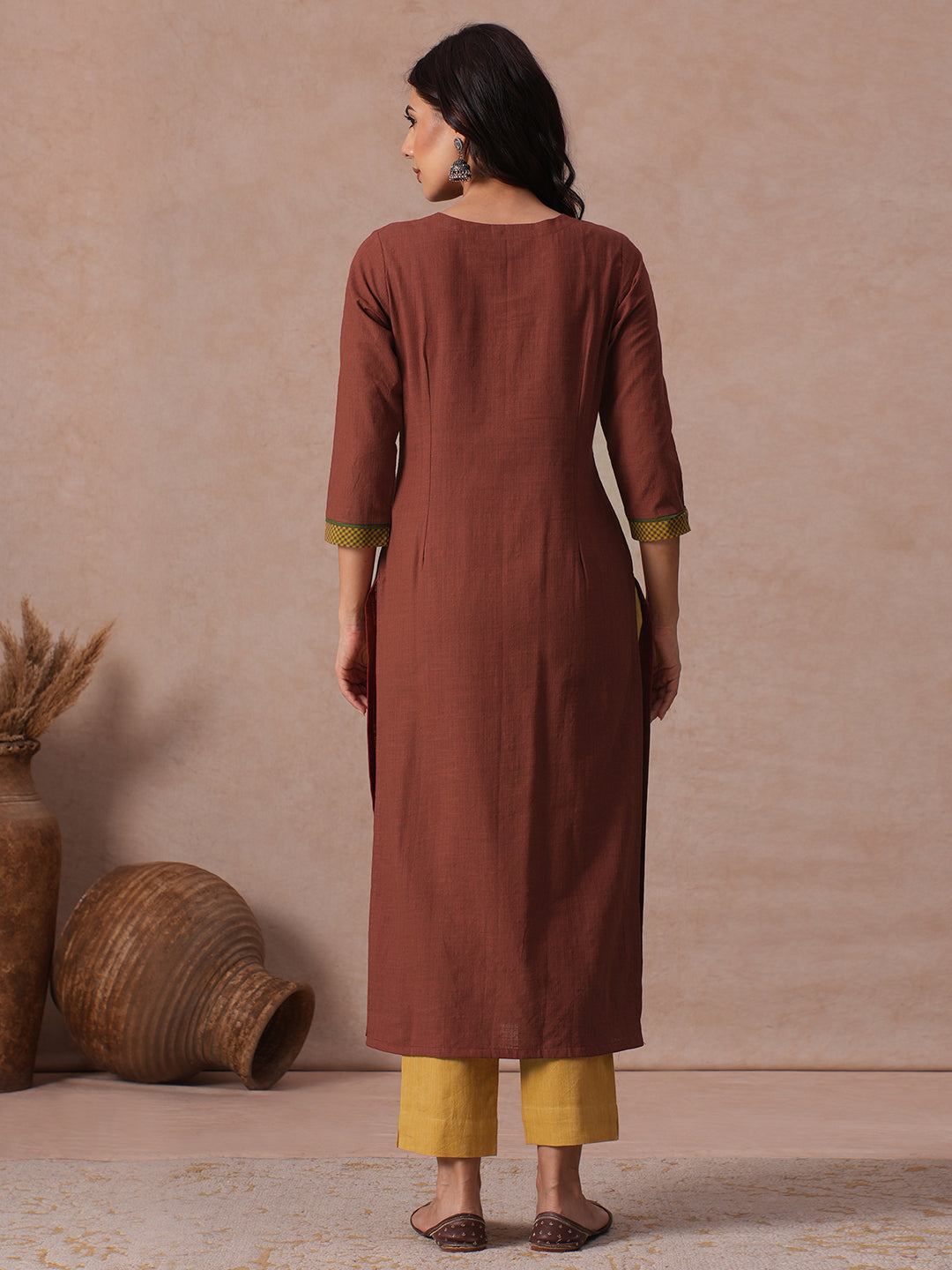 Cotton Straight Fit Kurta with Machine Applique and Contrast Fabric Sleeve Trims.