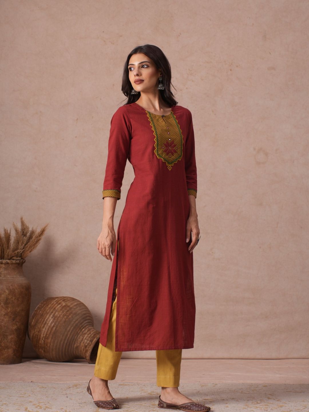 Cotton Straight Fit Kurta with Machine Applique and Contrast Fabric Sleeve Trims.