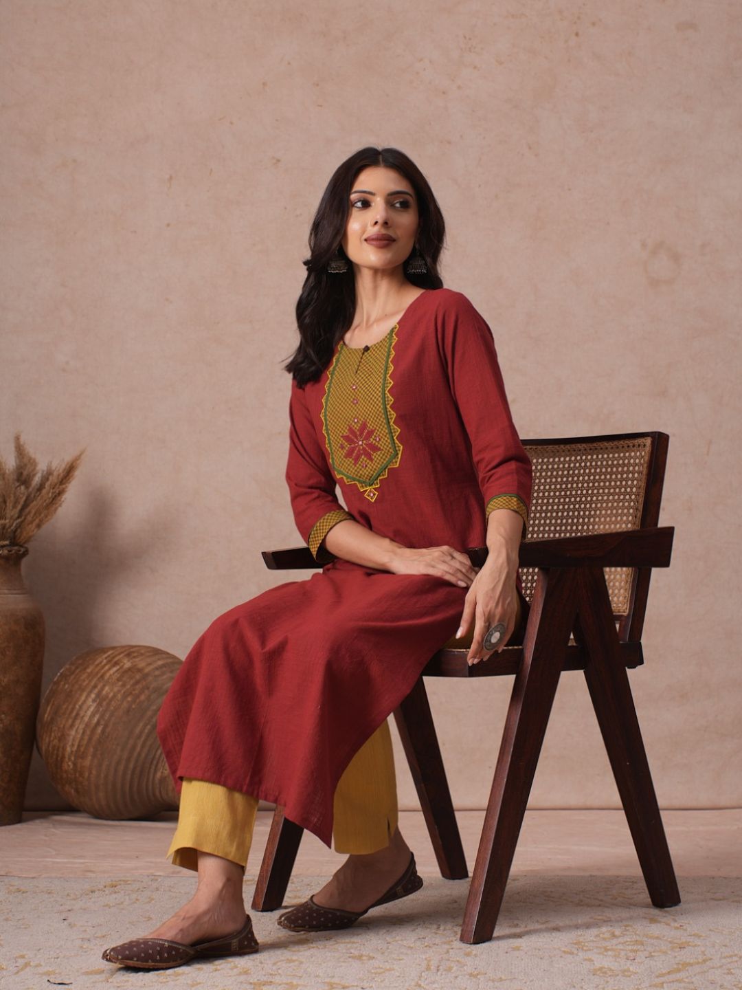 Cotton Straight Fit Kurta with Machine Applique and Contrast Fabric Sleeve Trims.