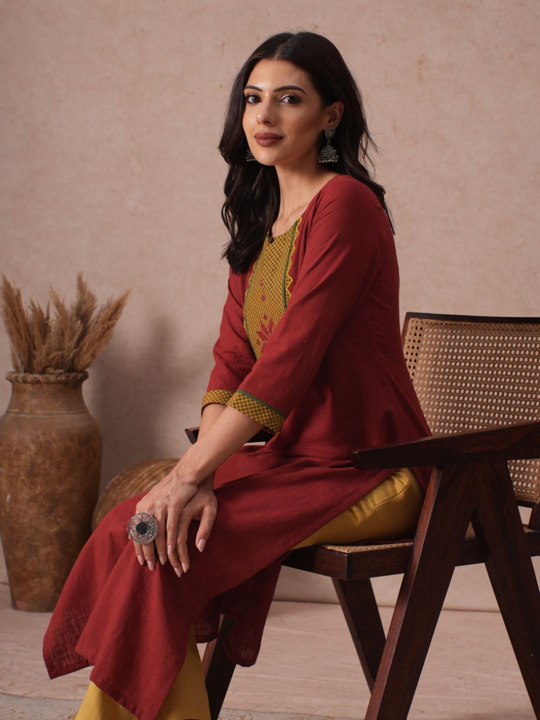 Cotton Straight Fit Kurta with Machine Applique and Contrast Fabric Sleeve Trims.