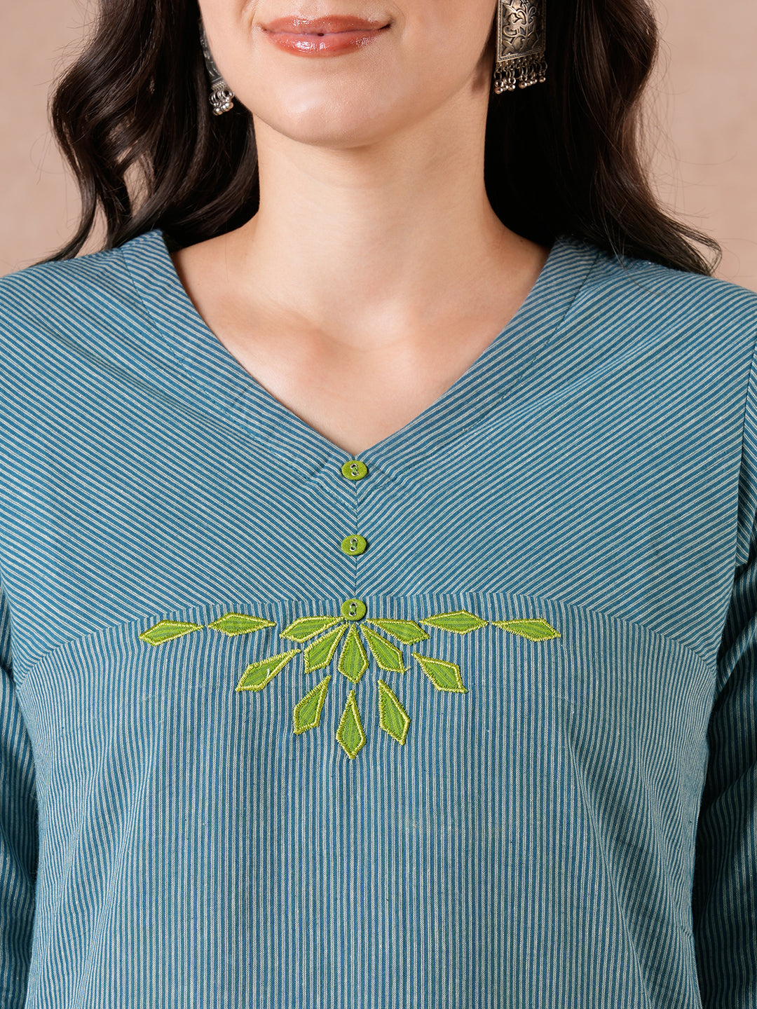 Straight Fit Cotton Kurta with Bias Yoke & Geometric Applique Detail.