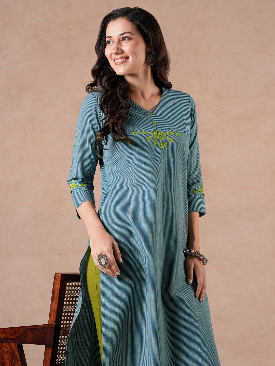 Straight Fit Cotton Kurta with Bias Yoke & Geometric Applique Detail.