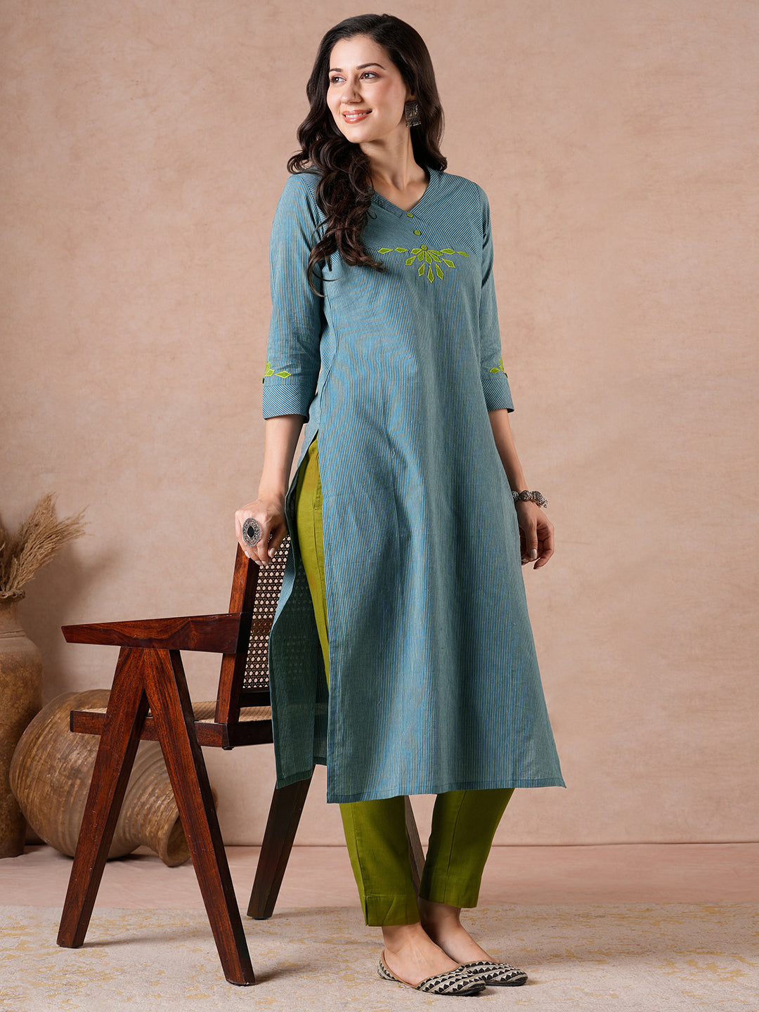 Straight Fit Cotton Kurta with Bias Yoke & Geometric Applique Detail.