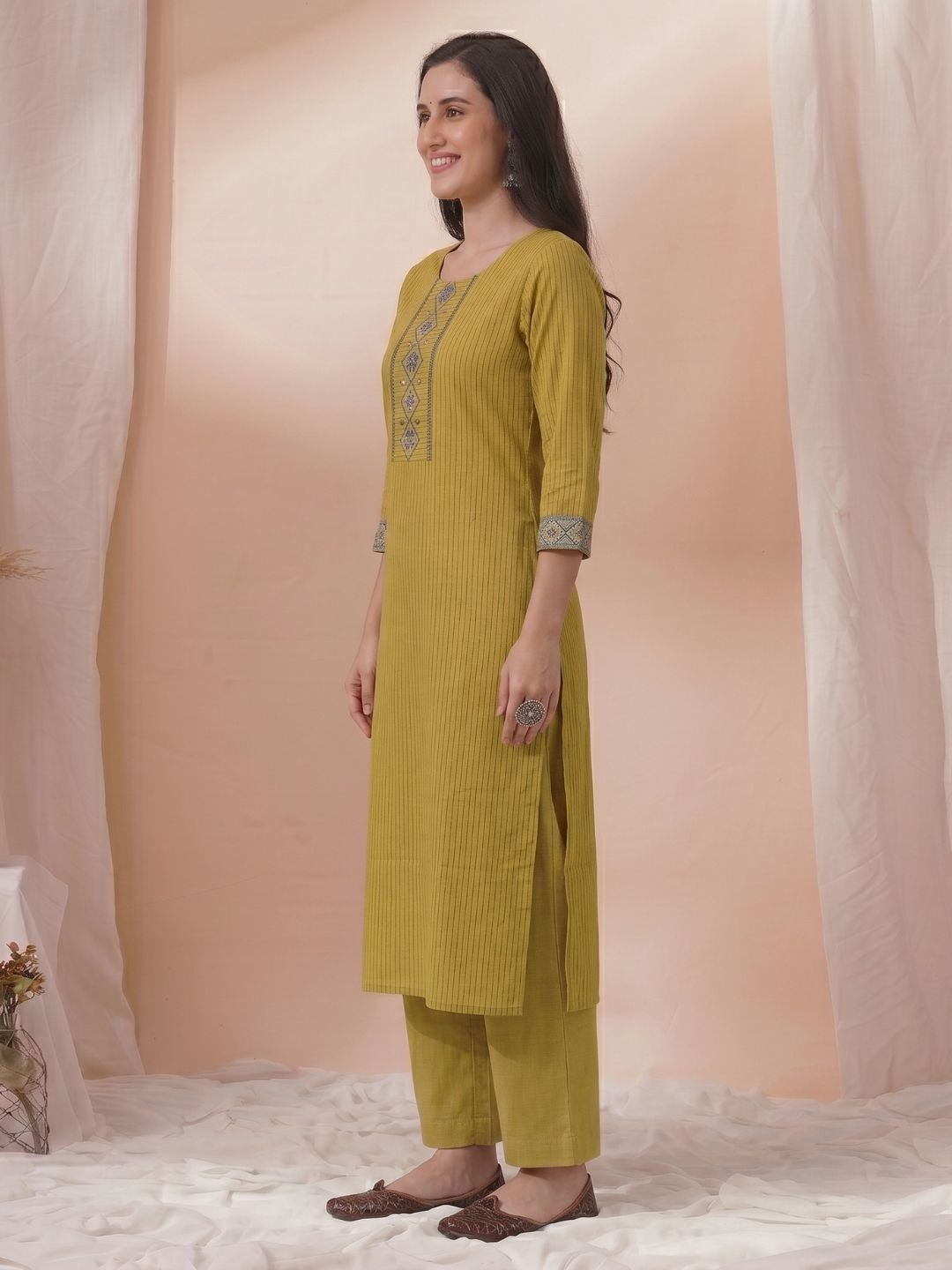 Straight Fit Cotton Striped Kurta with Kalamkari Applique & Piping Details.