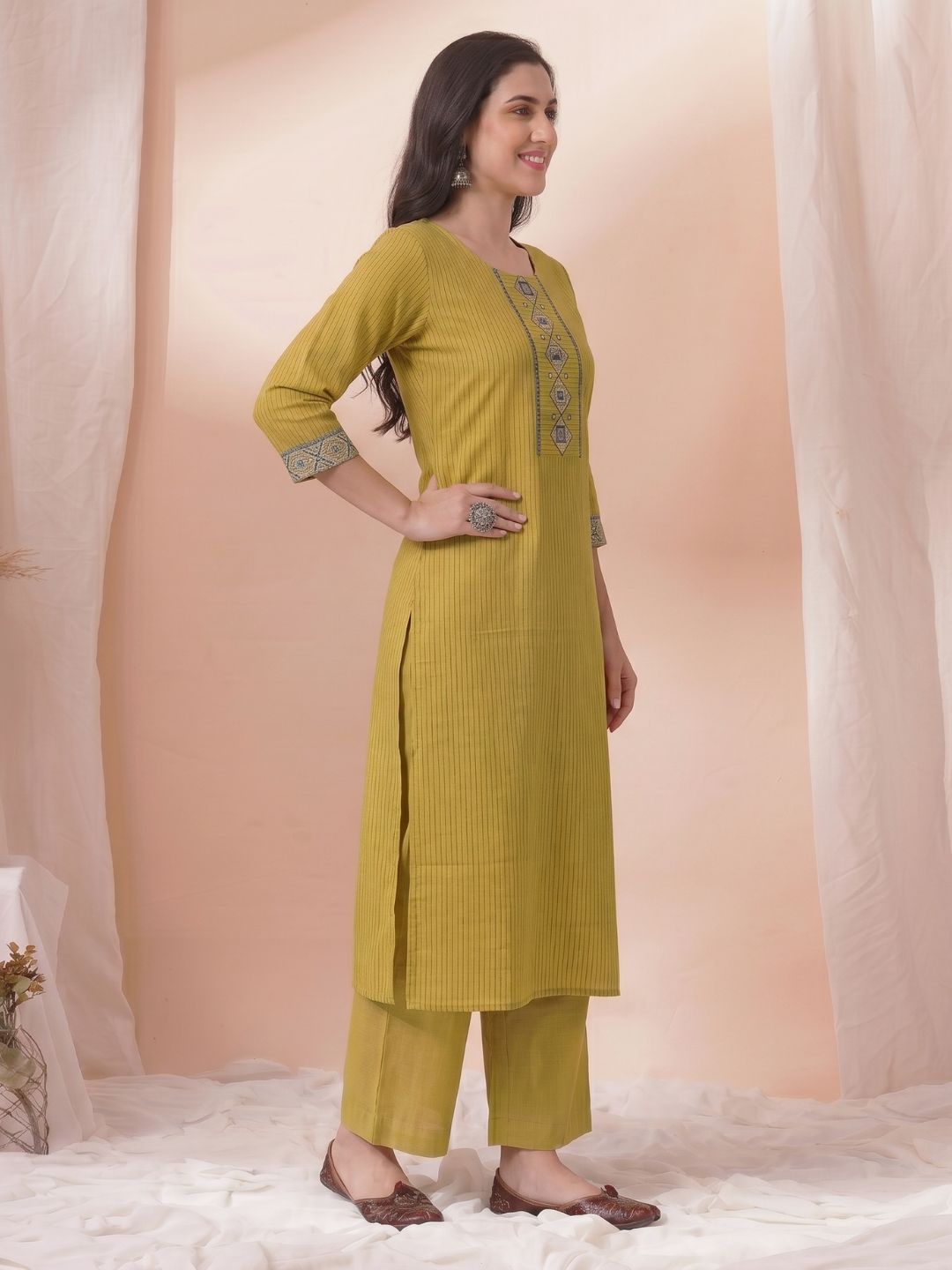 Straight Fit Cotton Striped Kurta with Kalamkari Applique & Piping Details.