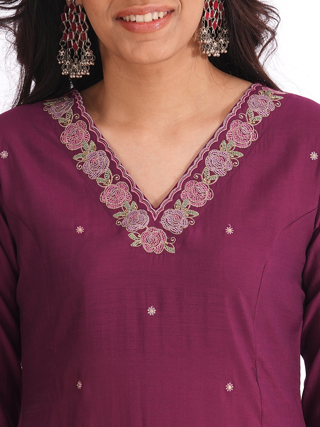 A-line kurta in silk blend fabric with thread and Zari embroidery paired with lined art silk palazzo