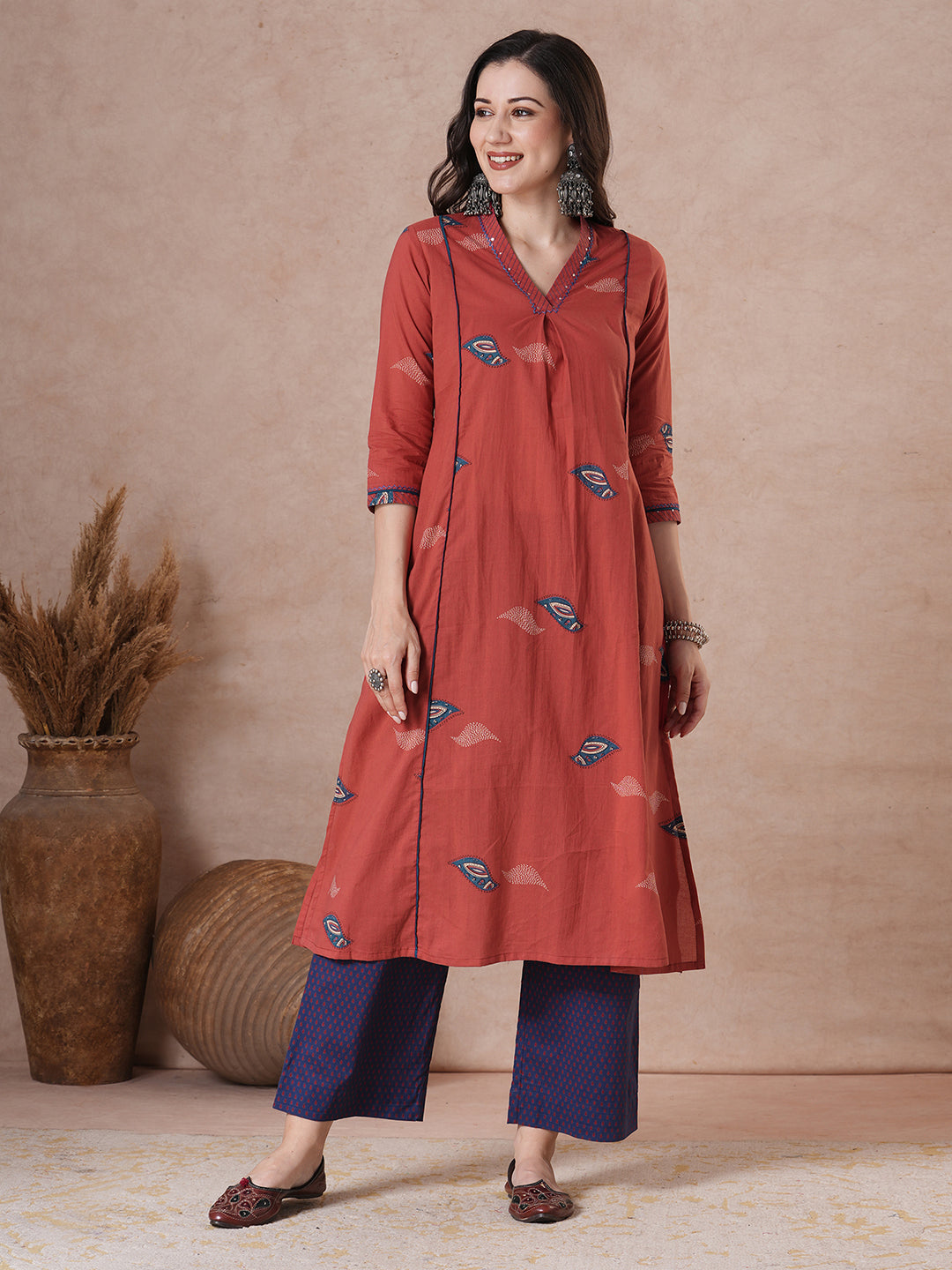 Red abstract printed A-Line Kurta Palazzo Set.