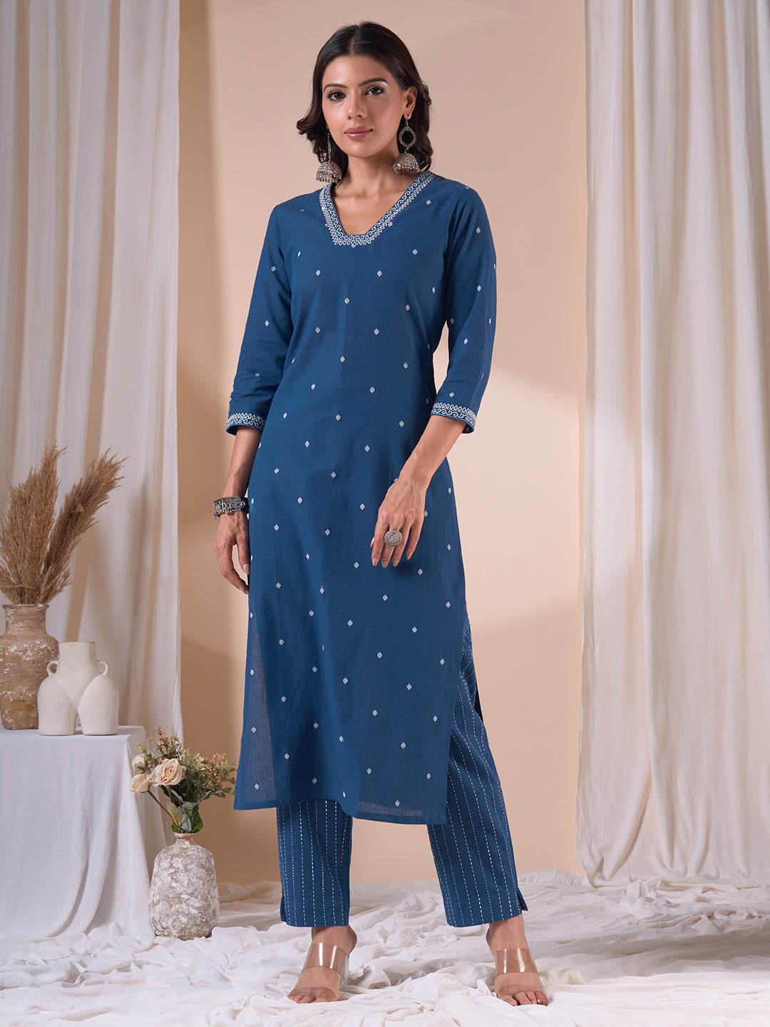 Cotton Dobby Straight Kurta Set with Resham Embroidery and Striped Kantha Pants.